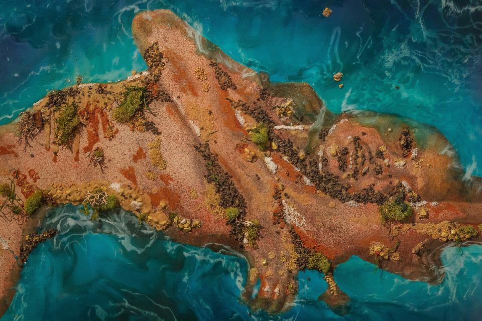 "Mother Earth 2021" by Dariel B. Donovan hangs in the ÒBeing Heard, Being SeenÓ art exhibit by local artists who identify as LGBTQ+ at the Cultural Council of Palm Beach County in downtown Lake Worth Beach, Fla., on Wednesday, March 16, 2022.