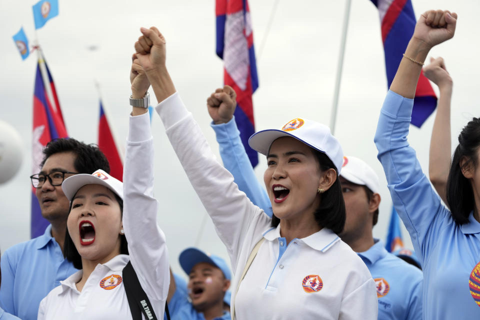 Supporters of the Cambodian People's Party participate in a procession to mark the end of its election campaign in Phnom Penh, Cambodia, Friday, July 21, 2023. (AP Photo/Heng Sinith)