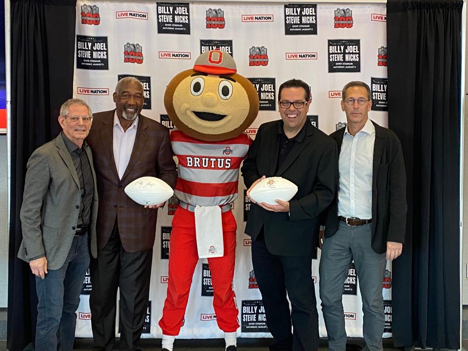 From left: Barry Gabel, senior vice president of marketing and sponsorship at Live Nation; Gene Smith, senior vice president and Wolfe Foundation endowed athletics director; Ohio State mascot Brutus Buckeye; Dave Redelberger, Columbus Area Sports and Entertainment director of interactive marketing; and Michael Belkin, Ohio market president of Live Nation.