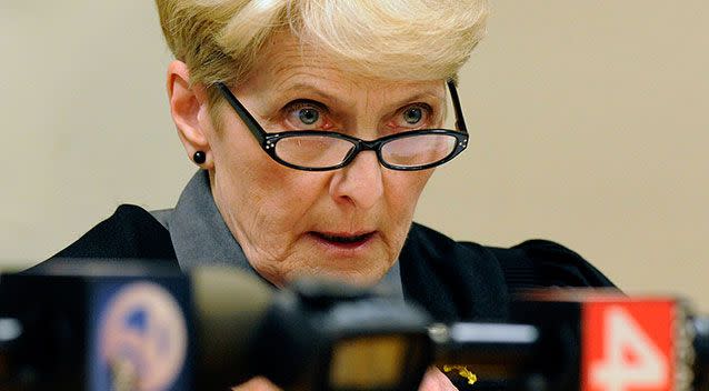 Magistrate Renee McDuffee talks with Wayne County Assistant Prosecutor Carin Goldfarb during the video arraignment of Mitchelle Blair. Photo: AP