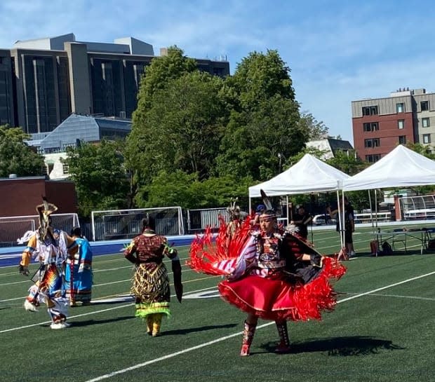 A pow wow vaccine clinic at the University of Toronto's Varsity Stadium included Indigenous dancing, singing, drumming and a teepee on Saturday in the hopes of creating a culturally safe space for Indigenous people to get vaccinated. (Dr. Lynn Wilson/Twitter - image credit)