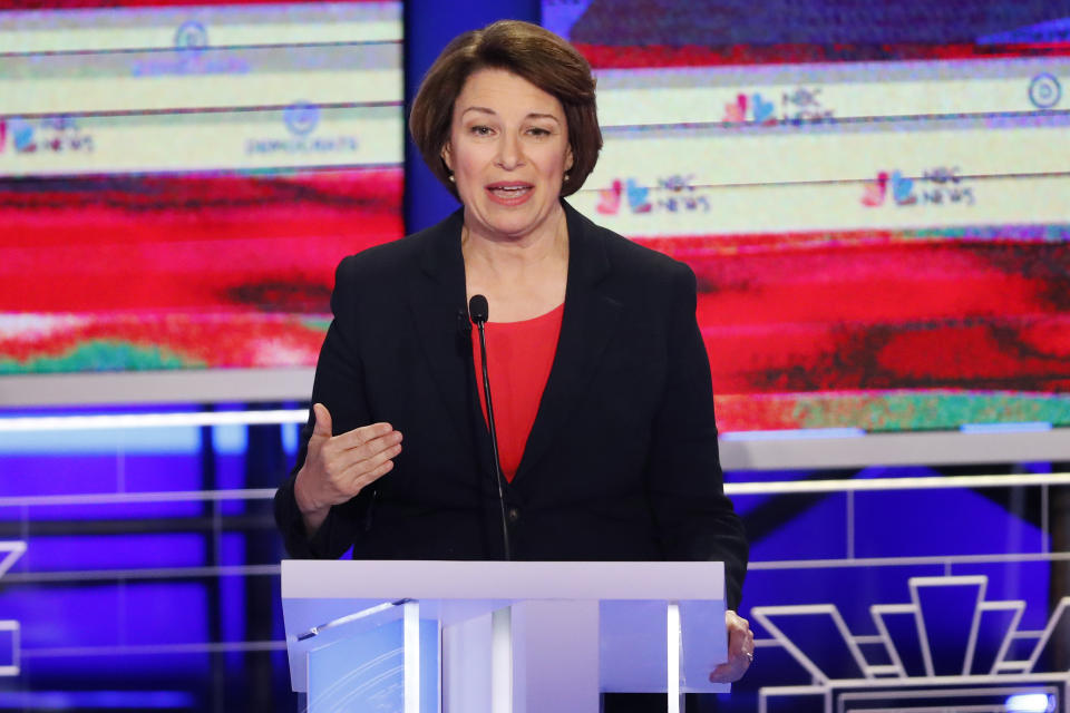 In this June 26, 2019, photo, Democratic presidential candidate Sen. Amy Klobuchar, D-Minn., gestures, during a Democratic primary debate hosted by NBC News at the Adrienne Arsht Center for the Performing Arts in Miami. It’s been tough to run for the Democratic presidential nomination as a moderate if your name isn’t Joe Biden. But some candidates hope that’s changing. (AP Photo/Wilfredo Lee)
