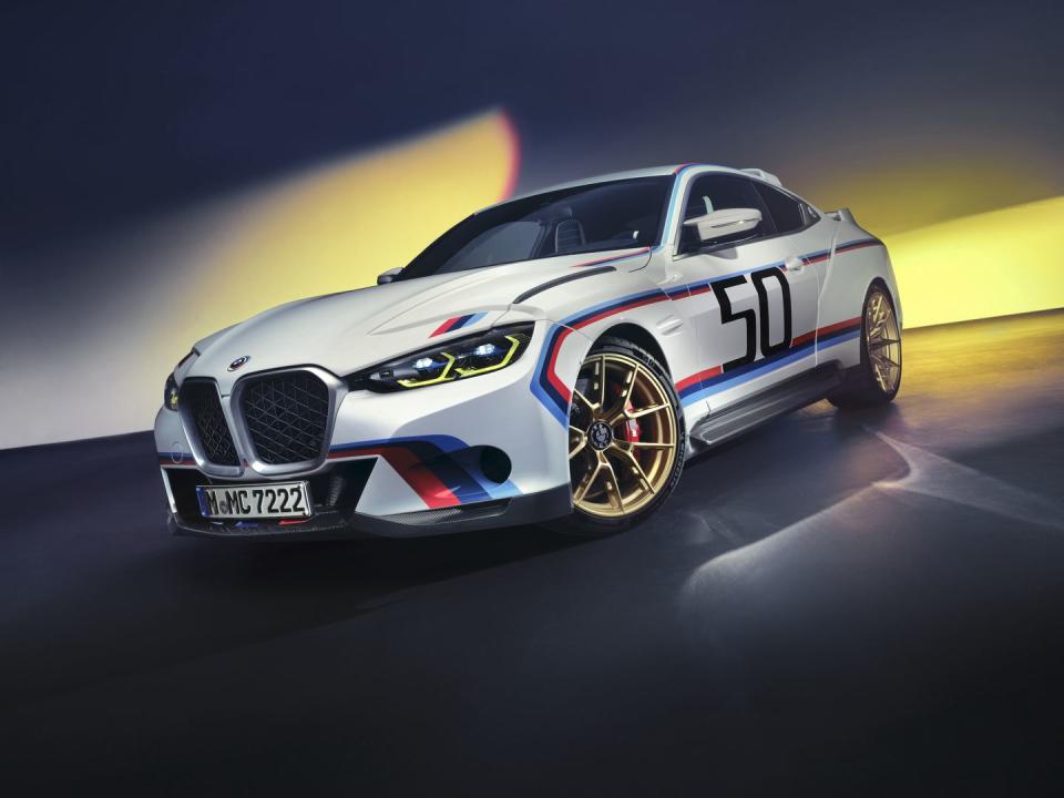 <p>The kidney grille is tamer than on most modern BMWs, and it flows into sharp headlights with yellow LED accents that mimic BMW's current M4 GT3 race car.</p>