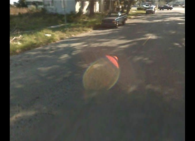 This very Earthbound lens flare was created by a Google Maps camera in November 2007 at Gulfport, Miss. Submitted to Huffington Post by Jenni Parker.