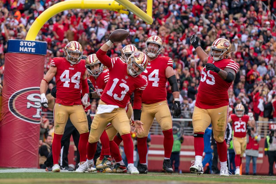 Brock Purdy (13) celebrates after scoring a touchdown during the 49ers' rout of the Buccaneers.