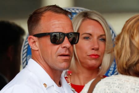 U.S. Navy SEAL Special Operations Chief Gallagher leaves court with his wife after the first day of jury selection at the court-martial trial at Naval Base San Diego