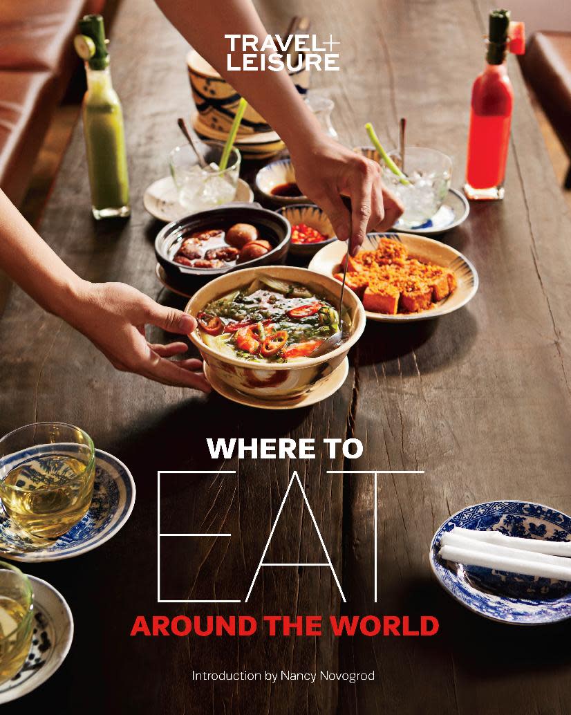 This image provided by Travel + Leisure shows the magazine’s book, “Where to Eat Around the World,” which spotlights food in 27 destinations, from the lunch canteens and taverns of Istanbul to barbecue in Texas. Many travelers are passionate about food, whether it’s enjoying that perfect meal on vacation or hunting down authentic local cuisine. (AP Photo/Travel + Leisure)