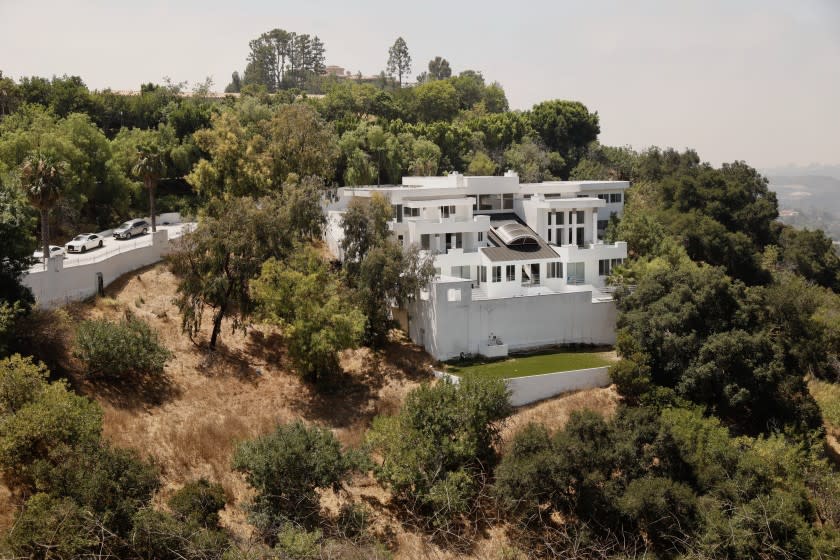 LOS ANGELES CA. AUGUST 4, 2020 -- View of the home in the 13200 block of Mulholland Drive, where gunfire early Tuesday left one woman dead and sent two other people to a hospital, at a massive party held in defiance of coronavirus-related health orders August 4, 2020. (Al Seib / Los Angeles Times)