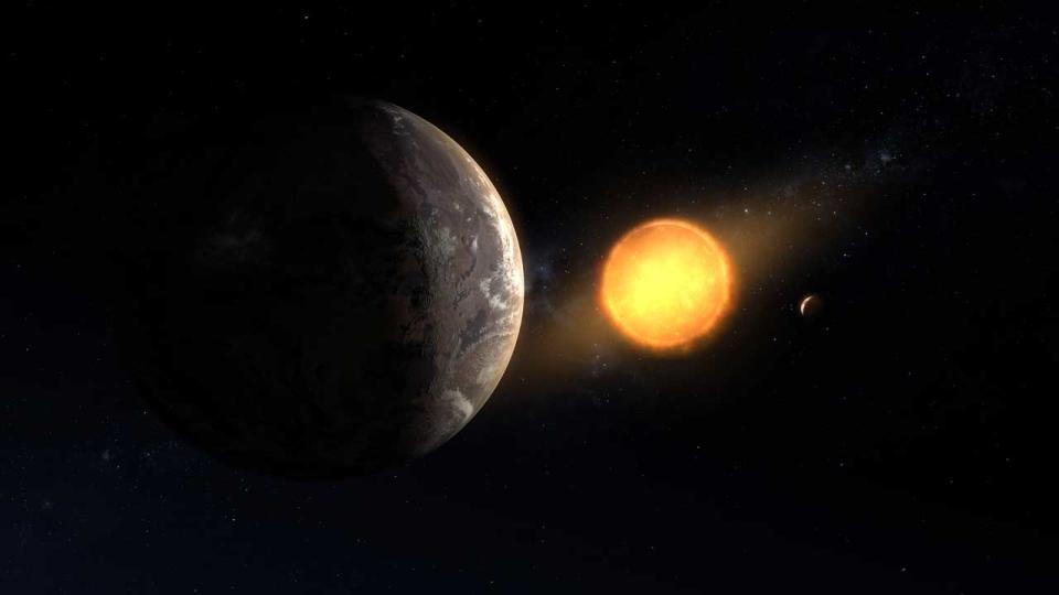 An artist's conception of Kepler-1649c (foreground) orbiting around its host red dwarf star. This newly discovered exoplanet is in its star’s habitable zone and is the closest to Earth in size and temperature found yet in Kepler's data.