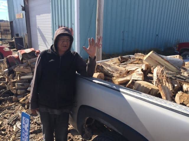 The nonprofit One Spirit hires five local residents to cut wood and deliver it to people in need on the reservation. The employees earn $100 to $150 per delivery. (Photo: Jeri Baker/One Spirit)