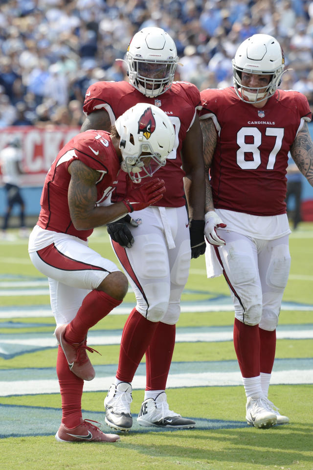 Murray gets 5 TDs, Jones 5 sacks as Cards rout Titans 38-13