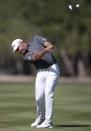 England's Lee Westwood plays a shot on the 2nd fairway during the final round of the Abu Dhabi Championship golf tournament in Abu Dhabi, United Arab Emirates, Sunday, Jan. 19, 2020. (AP Photo/Kamran Jebreili)