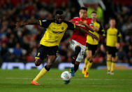Soccer Football - Carabao Cup Third Round - Manchester United vs Burton Albion - Old Trafford, Manchester, Britain - September 20, 2017 Manchester United's Jesse Lingard in action with Burton Albion's Hope Akpan REUTERS/Andrew Yates