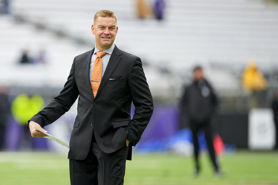 Former NFL and Washington quarterback Brock Huard walks on the field before calling an NCAA college football game between Washington and Utah for Fox Sports, Saturday, Nov. 11, 2023, in Seattle. The final football season for the Pac-12 with its current membership is coming to a thrilling conclusion. The conference wraps up regular-season play this week before the title game in Las Vegas on Dec. 1, 2023. Washington and Oregon still have hopes of getting the Pac-12 its first College Football Playoff berth since 2016. (AP Photo/Lindsey Wasson)