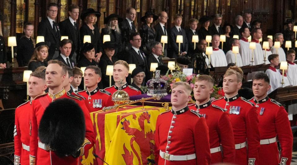 David Sanderson, 19, is seen carrying the Queen’s casket at the front right hand side (Getty Images)