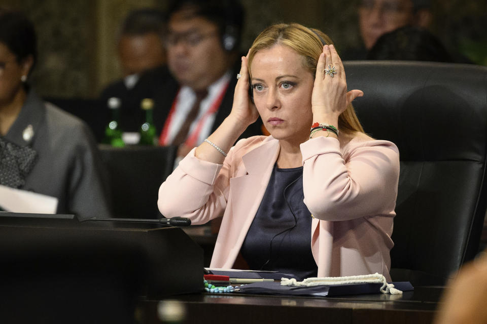 FILE - Italian Prime Minister Giorgia Meloni attends a working session on food and energy security during the G20 Summit in Nusa Dua, Bali, Indonesia Tuesday, Nov. 15, 2022. Italian Premier Giorgia Meloni is looking to boost already strong energy ties with Algeria to further wean Italy off Russian energy, a focus of her two-day visit to the North African nation starting Sunday, Jan. 21, 2023. (Leon Neal/Pool Photo via AP, File)