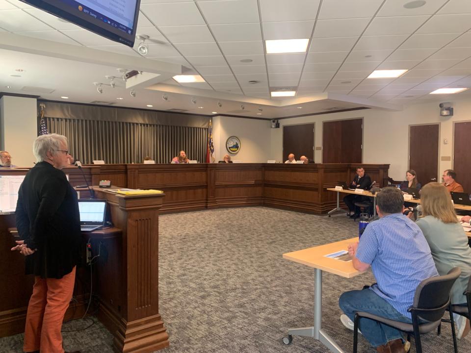 Donna Trunk, left, takes the stand during the March 13 Board of Adjustment meeting on the Big Sandy Mush LLC landing strip.