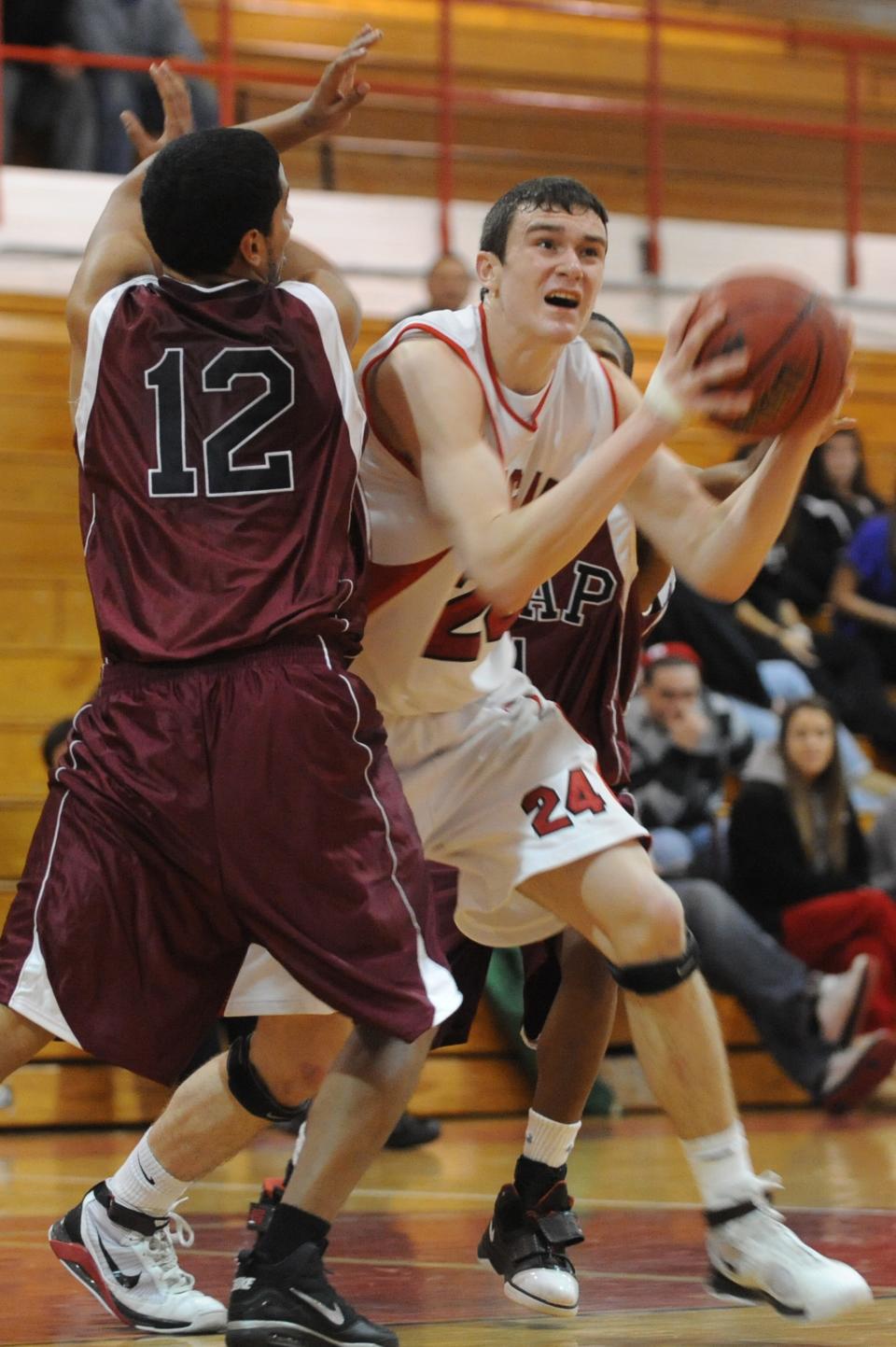 Cherry Hill East's Chris Santo makes a move to the basket during a game in 2009.