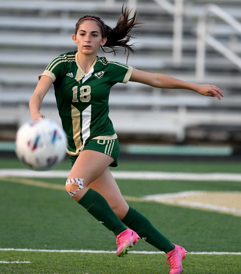 GlenOak's Brooklyn Walker chases the ball against Green, Wednesday, Sept 20, 2023.