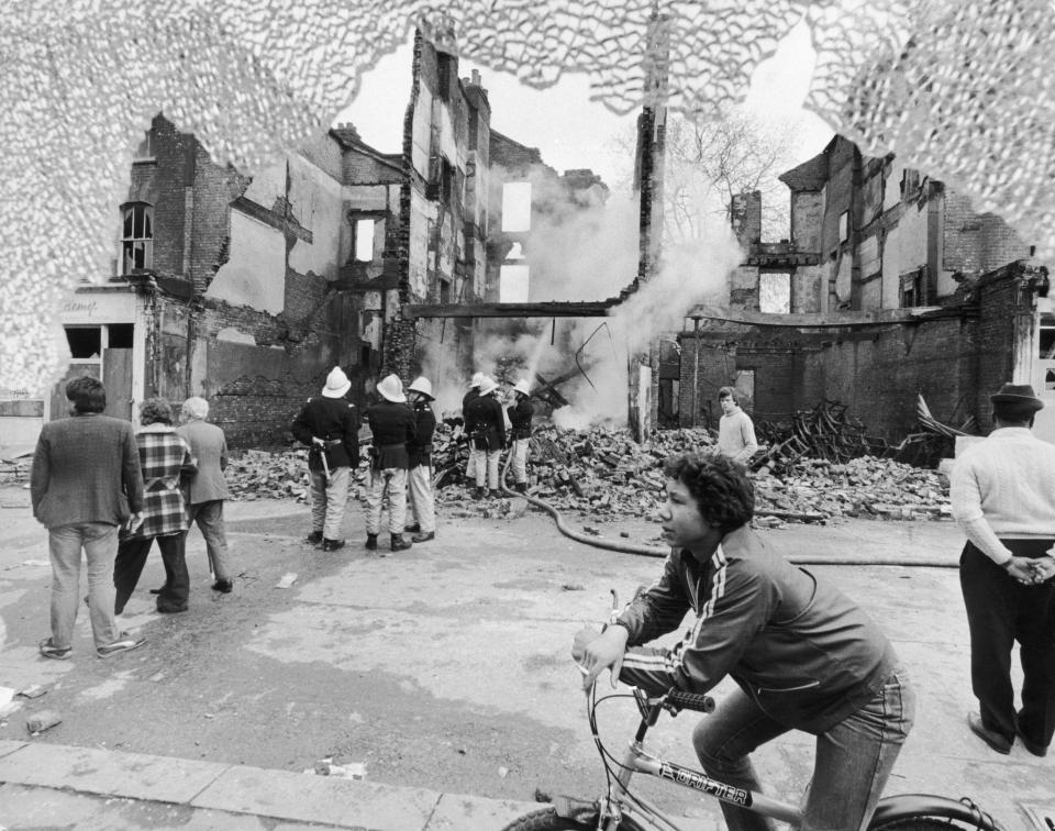 Damage to a shop front after the Brixton riots - GETTY