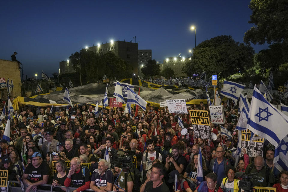 Israelis protest against a budget proposed by Prime Minister Benjamin Netanyahu's government ahead of a parliamentary vote and its plans to overhaul the country's judicial system in Jerusalem, Tuesday, May 23, 2023. (AP Photo/Mahmoud Illean)