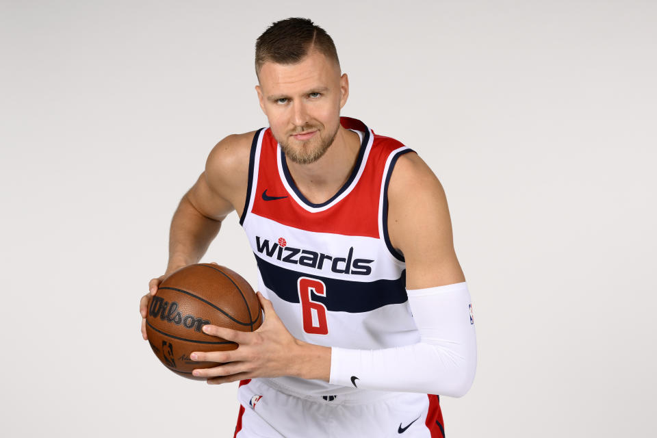 Washington Wizards center Kristaps Porzingis poses for a photograph during an NBA basketball media day, Friday, Sept. 23, 2022, in Washington. (AP Photo/Nick Wass)