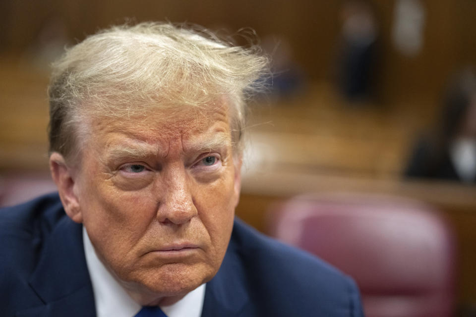 Former President Donald Trump awaits the start of proceedings during jury selection at Manhattan criminal court, Thursday, April 18, 2024 in New York. (Jeenah Moon/Pool Photo via AP)