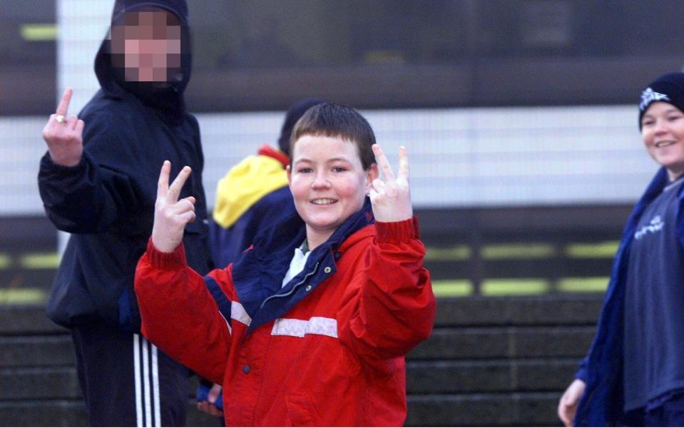 'Brothers from Hell': a 14-year-old Joseph McCann (centre) in 1999, after he and his brothers had received one of the country's first Anti-social Behaviour Orders - MEN Media