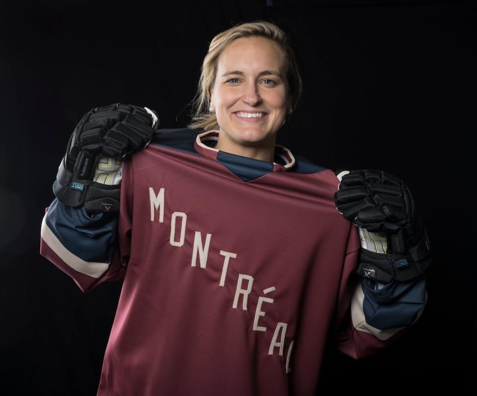Marie Philip-Poulin wears PWHL Montreal's new home jersey.