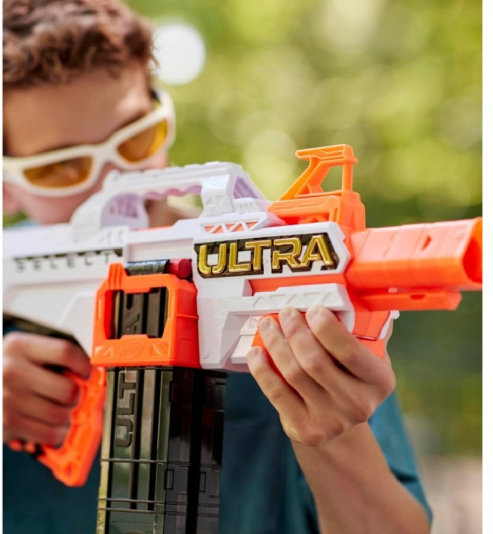 Boy holding the Nerf Ultra Select.