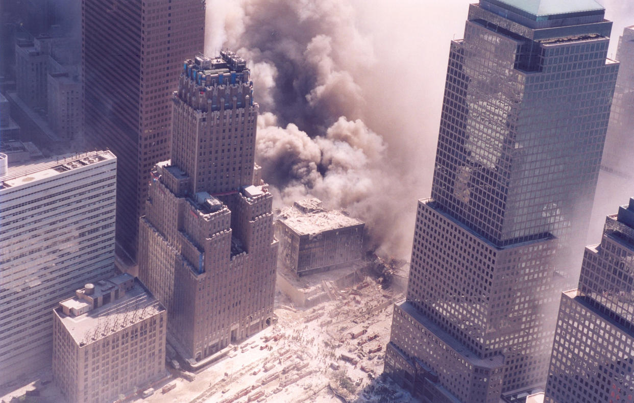 The World Trade Center during the September 11 terrorist attacks. (Photo Credit: NIST)