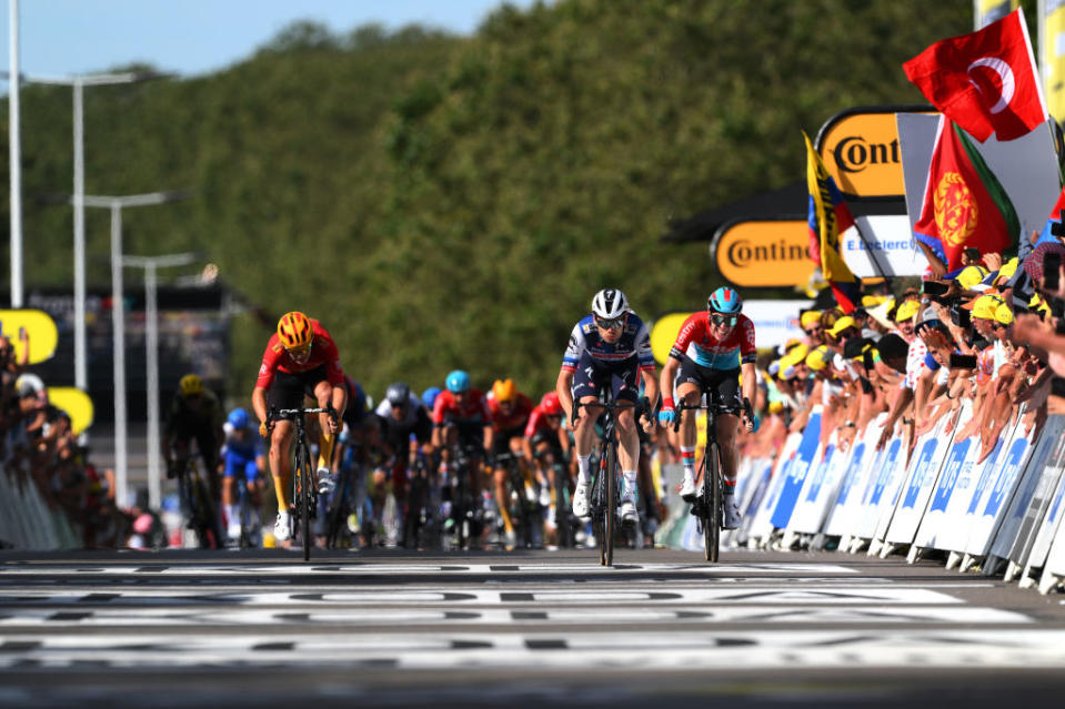 BOURGENBRESSE FRANCE  JULY 20 LR Jonas Abrahamsen of Norway and UnoX Pro Cycling Team Kasper Asgreen of Denmark and Team Soudal  Quick Step Pascal Eenkhoorn of The Netherlands and Team Lotto Dstny sprint at finish line to win the stage during the stage eighteen of the 110th Tour de France 2023 a 1849km stage from Motiers to BourgenBresse  UCIWT  on July 20 2023 in BourgenBresse France Photo by David RamosGetty Images