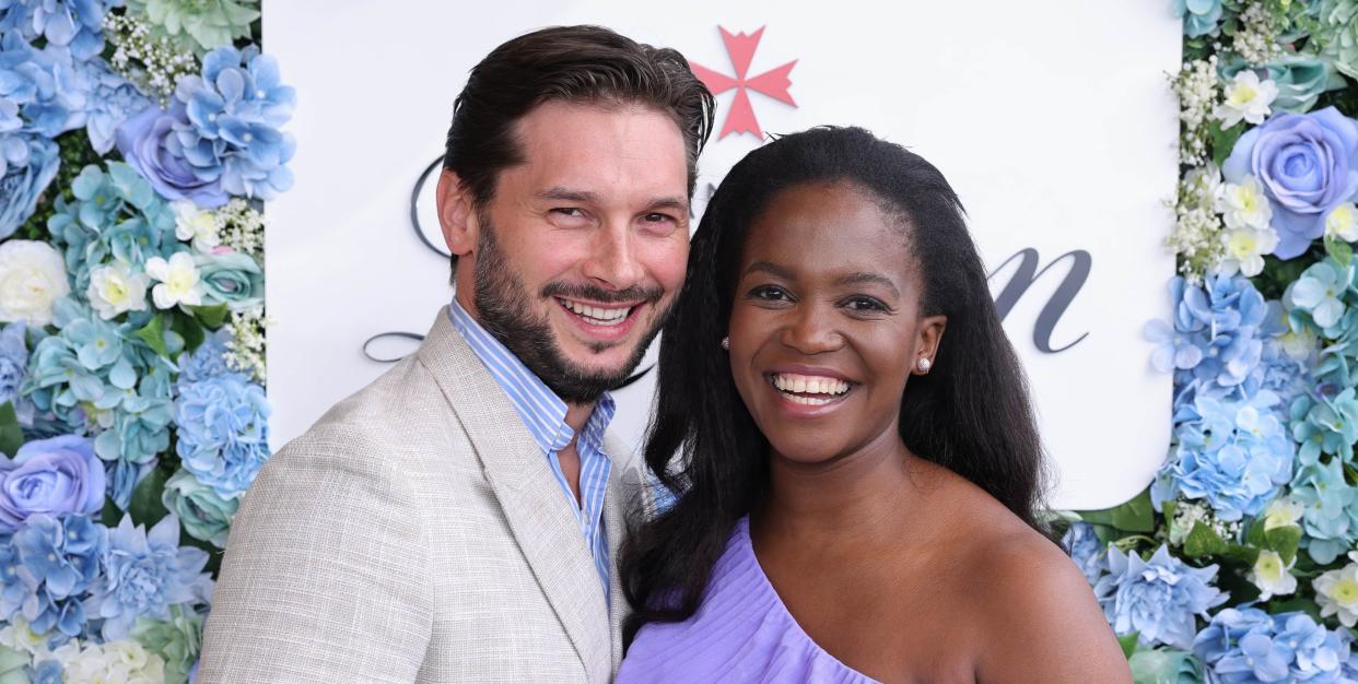 marius iepure and oti mabuse posing next to each other and smiling