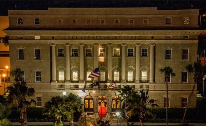 According to local historian Bob Grenier, a figure can be seen in the upper left window of the historic courthouse in Tavares.