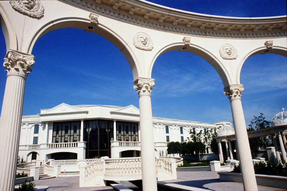 This March 19, 1998 photo shows the gardens and fountains on the grounds of Trinity Broadcasting Network's international headquarters in Costa Mesa, Calif., showing the newly romodled building. Doug Marsh, art director of TBN, designed the remodeling project for TBN's new headquarters. (AP Photo/Orange County Register, Leonard Ortiz) MAGS OUT; LOS ANGELES TIMES OUT