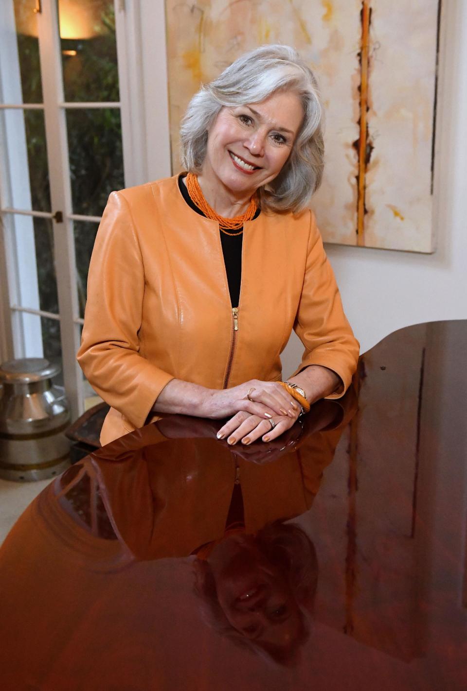 In this Friday, Feb. 3, 2017, photo, Kathryn Leigh Scott poses at her home in Beverly Hills, Calif. Scott, who was a Bunny at the Playboy Club in Manhattan during the 1960's, at the same time as feminist Gloria Steinem, has written a history of the Playbook clubs, titled "The Bunny Years," interviewing 300 other former Bunnies around the world. (AP Photo/Mark J. Terrill)