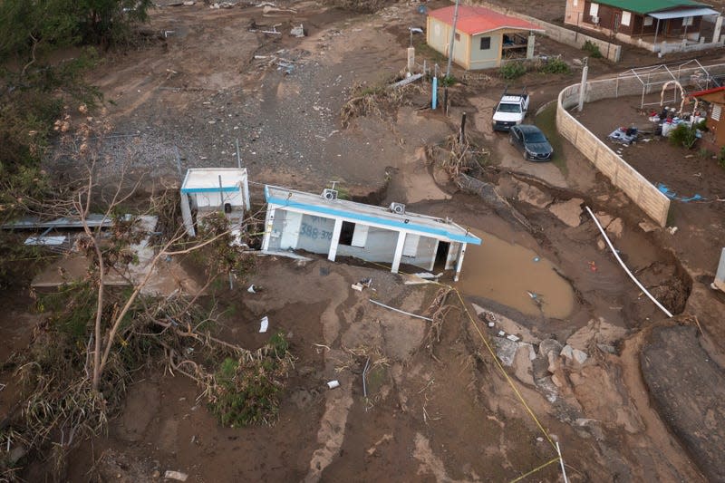 A house lays in the mud after it was washed away by Hurricane Fiona at Villa Esperanza in Salinas, Puerto Rico, Wednesday, Sept. 21, 2022.