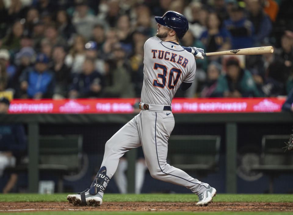 Houston Astros' Kyle Tucker hits a solo home run off Seattle Mariners starting pitcher Luis Castillo during the sixth inning of a baseball game, Monday, Sept. 25, 2023, in Seattle. (AP Photo/Stephen Brashear)