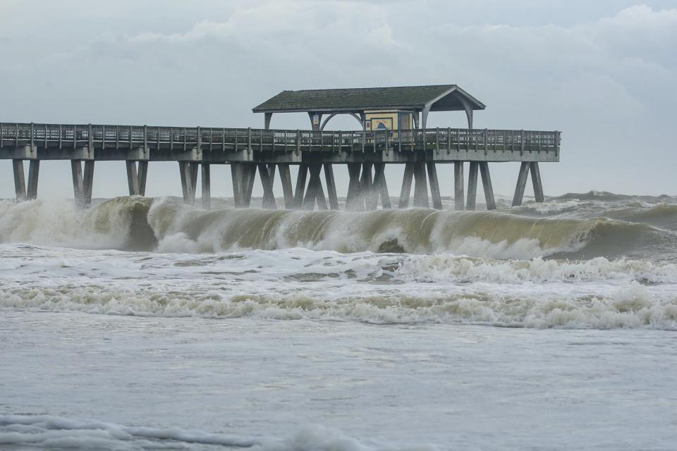 Large waves crashed onto the beach of Tybee Island, Ga., Wednesday, Sept. 4, 2019 as Hurricane Dorian moved closer to the Georgia coast. (Casey Jones/Savannah Morning News via AP)