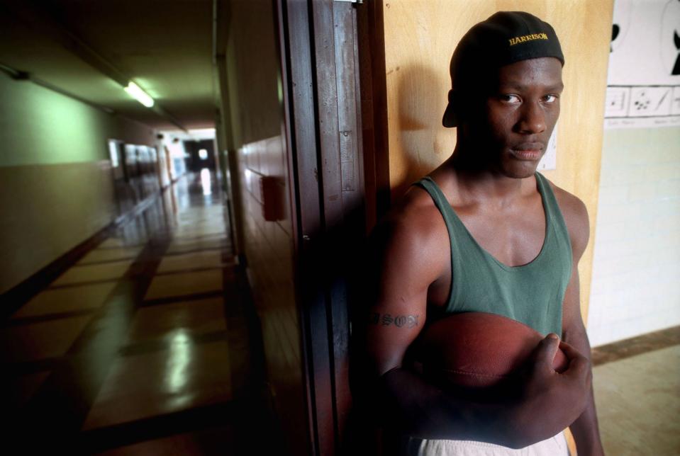 Coventry running back James Harrison poses before the 1996 high school football season.