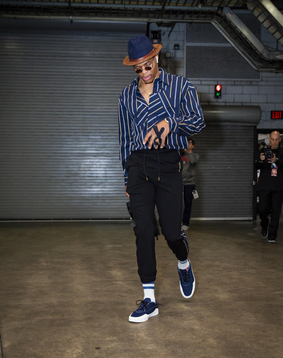 Russell Westbrook wears Two Guys’ Bow Tie Co wood brim fedora and Jordan Westbrook 0.3 Sneakers on April 16.