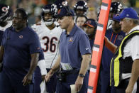 Chicago Bears head coach Matt Eberflus, center, watches from the sideline during the first half of an NFL football game against the Green Bay Packers Sunday, Sept. 18, 2022, in Green Bay, Wis. (AP Photo/Mike Roemer)