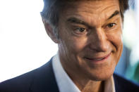 Republican nominee for U.S. Senate, Dr. Mehmet Oz, center, drops by The Capitol Diner, Friday, Aug. 12, 2022, in Swatara Township, Pa. Pennsylvania Senate candidate John Fetterman is expected to open up about his personal health challenges as he officially returns to the campaign trail Friday. Republican opponent Dr. Oz has railed against Fetterman’s prolonged public absence throughout the summer. (Sean Simmers/The Patriot-News via AP)