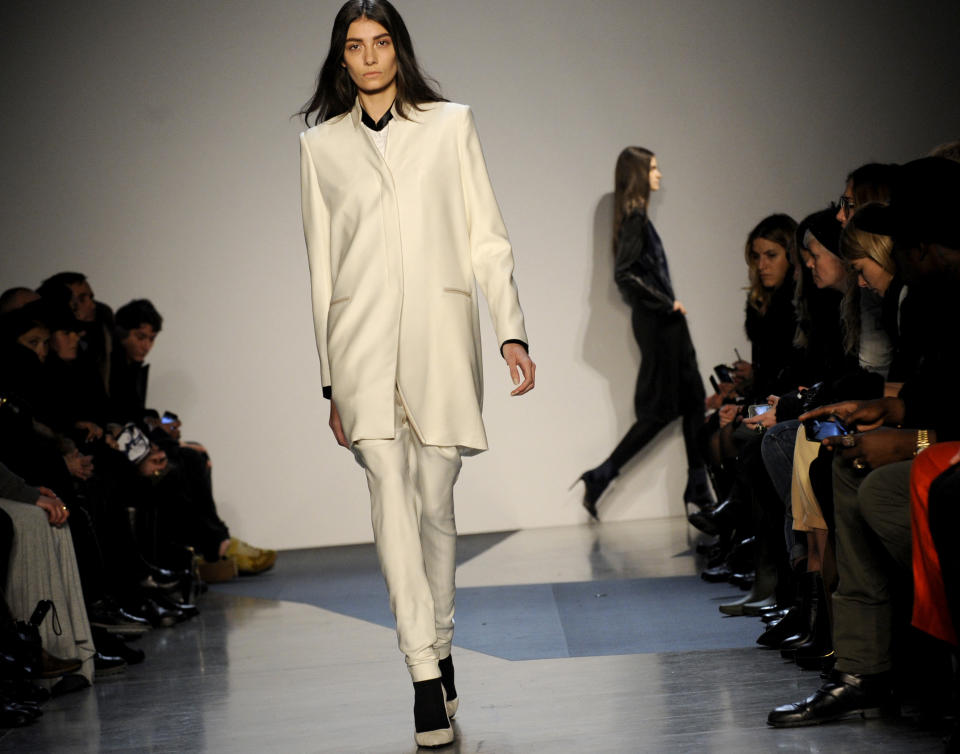 The Helmut Lang Fall 2013 collection is modeled during Fashion Week, Friday, Feb. 8, 2013, in New York. (AP Photo/Louis Lanzano)