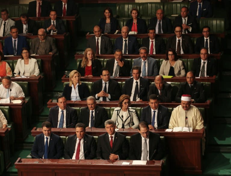 Tunisia's new cabinet draws members from all sides of the political spectrum, and includes eight women "in important" positions and "14 young" ministers