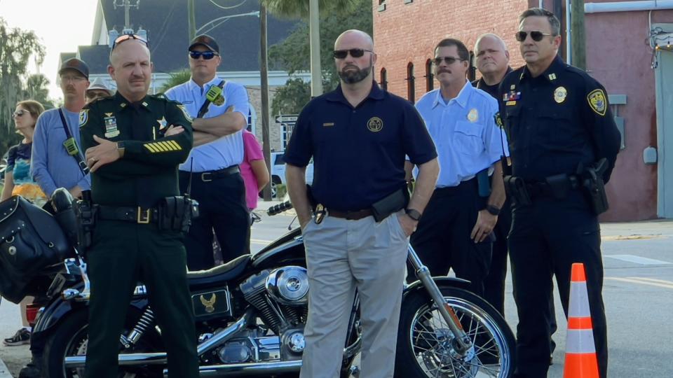 Leesburg Police Chief Rob Hicks, second from right, and Leesburg police officers, first responders and sheriff's personnel showed up for the 22nd anniversary 9/11 remembrance on Monday.