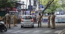 PUNE, INDIA - MARCH 26: Police bandobast at Sahakar nagar, on March 26, 2020 in Pune, India. Prime Minister Narendra Modi on Tuesday announced complete lockdown of the entire country, as part of the governments stringent efforts to tackle coronavirus disease Covid-19. This lockdown will be in place for 21 days and more stringent than Janta Curfew. Although, ration shops, groceries, fruits and vegetable shops, dairy and milk booths, meat and fish shops, animal fodder will remain open during the 21-day lockdown. (Photo by Pratham Gokhale/Hindustan Times via Getty Images)