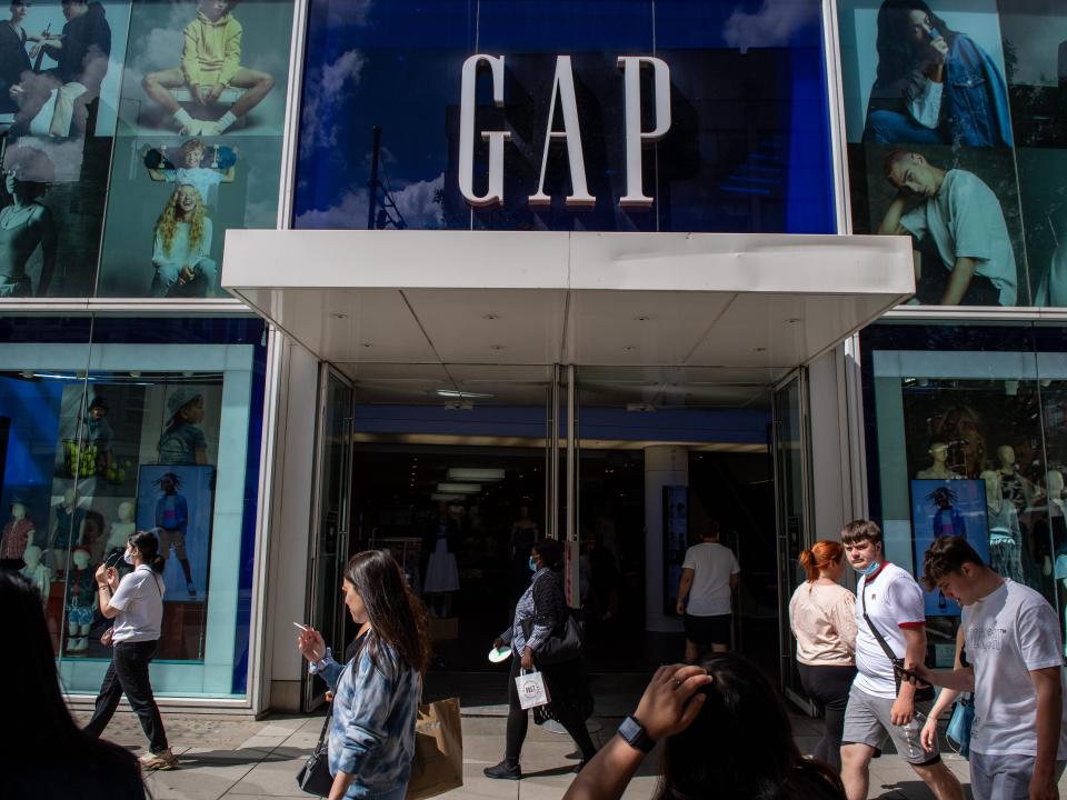 Shoppers pass the GAP store on Oxford Street on June 10, 2021 in London, England.