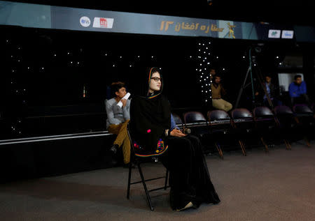 Zulala Hashimi 18, a singer finalist of the music contest 'Afghan Star', waits for her turn to perform during a rehearsal for the show in Kabul, Afghanistan March 19, 2017. Picture taken March 19, 2017. REUTERS/Mohammad Ismail