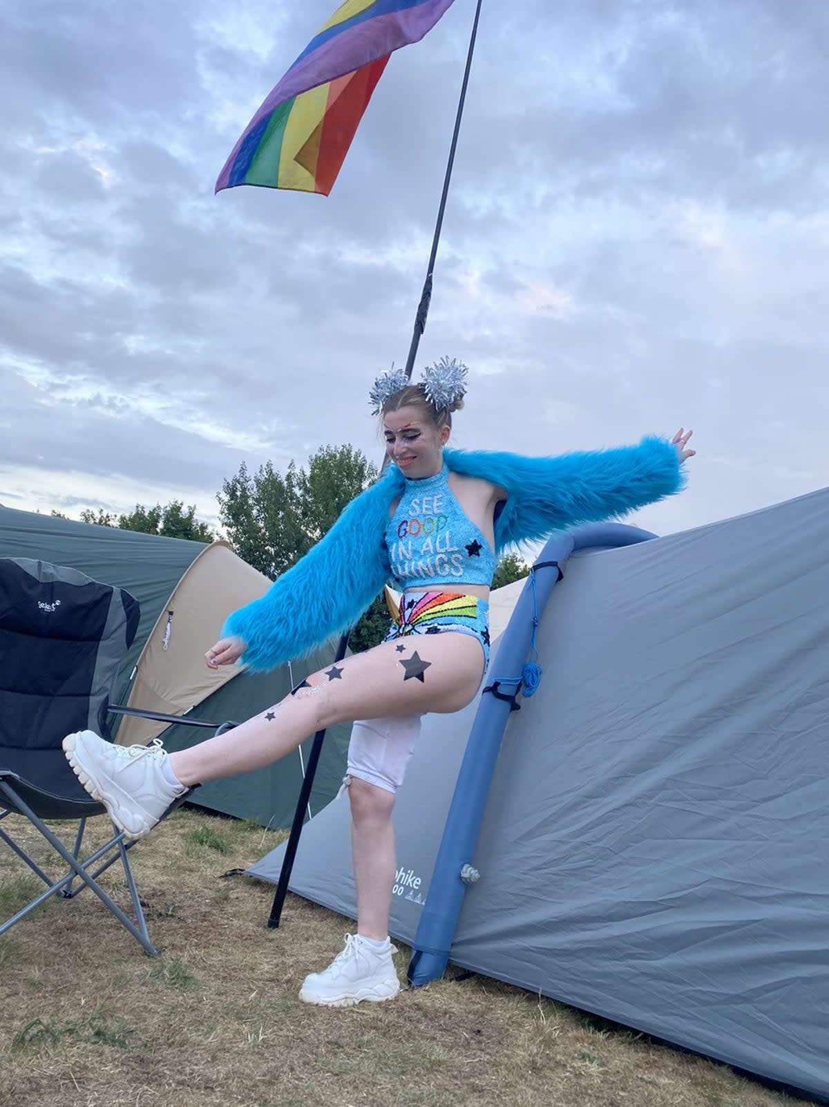 Sophie Anderson, 24, dressed in her blue bikini and furry jacket at a festival this summer (Collect/PA Real Life)